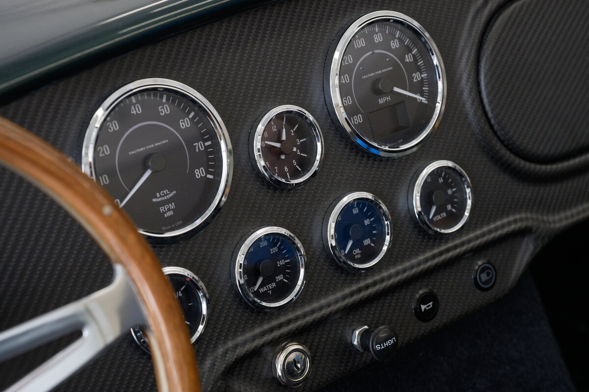Carbon fiber dashboard with Factory Five Racing gauges
